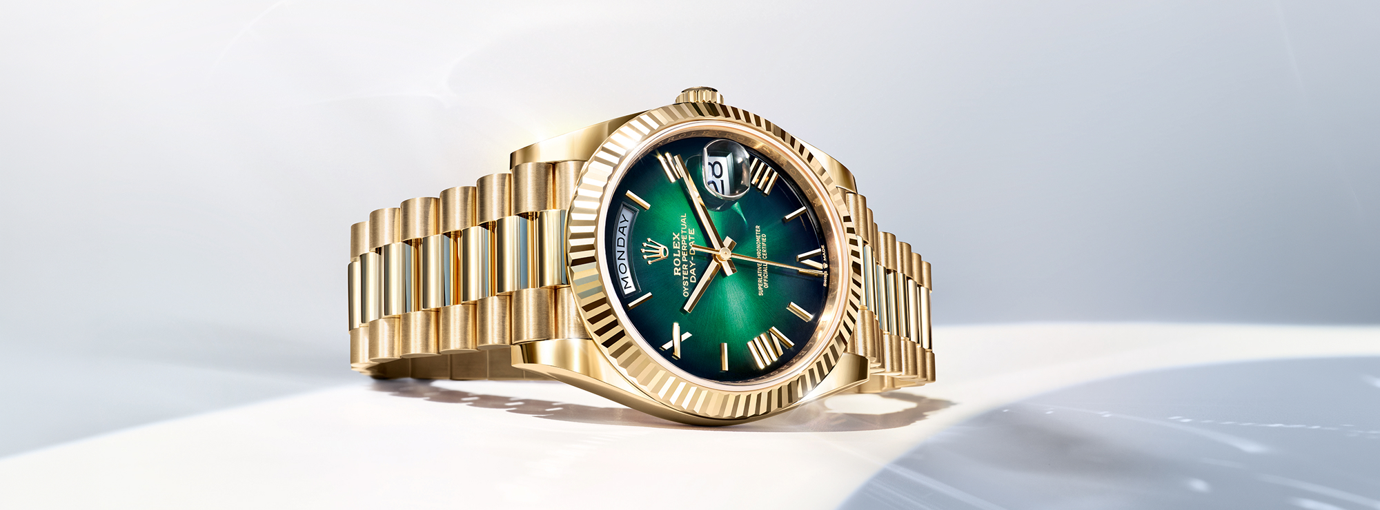 Rolex Day-Date in Gelbgold mit grünem Zifferblatt – modernes Modell